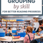 A small group of students engages in reading activities at tables in a classroom, with colorful bins for supplies visible in the background and a teacher facilitating the lesson.