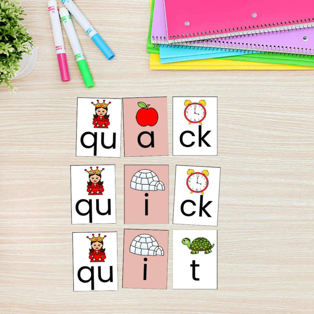 grapheme cards laid out for reading qu words